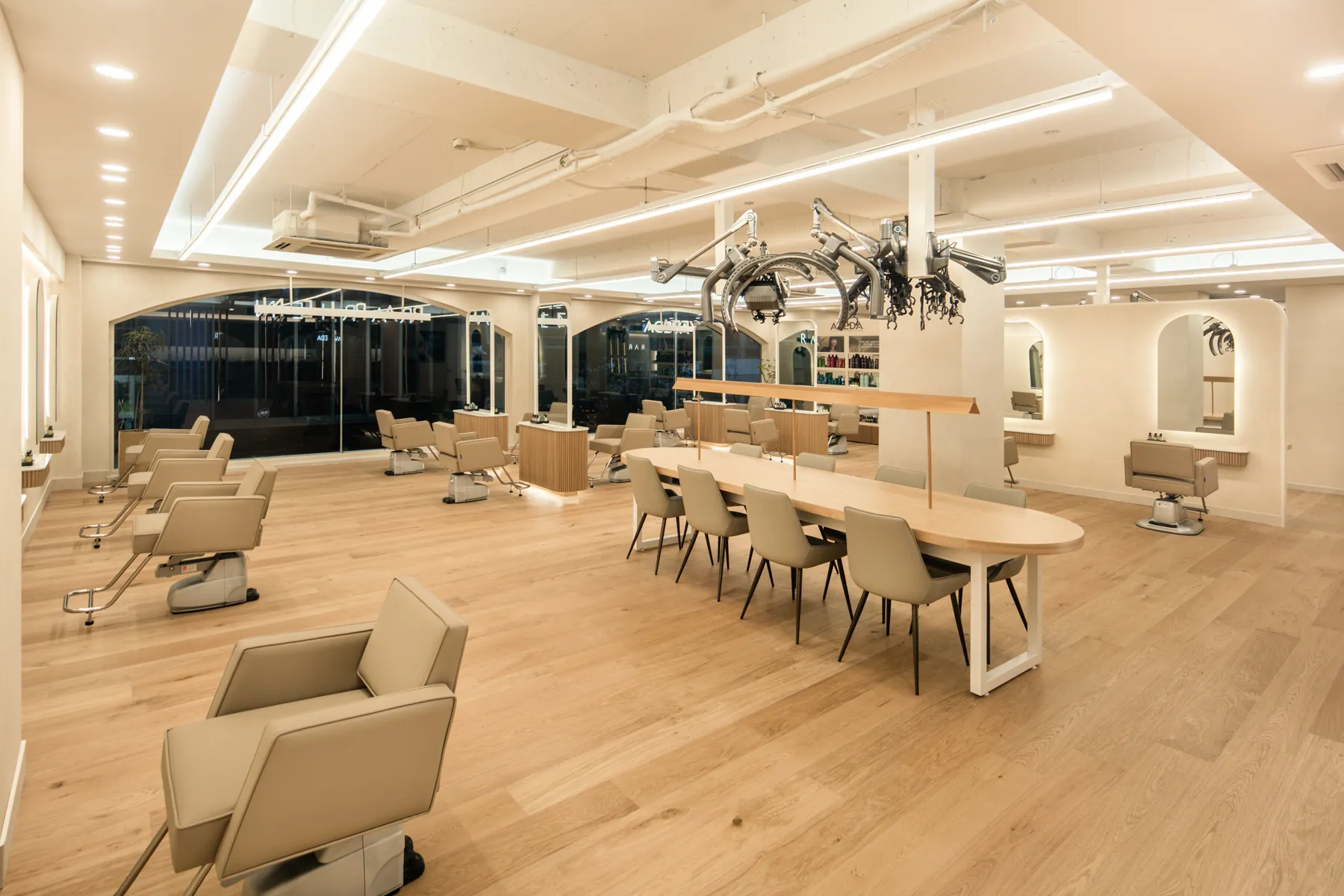 Shampoo and spa area behind a wooden screen · RARIEN Gangnam